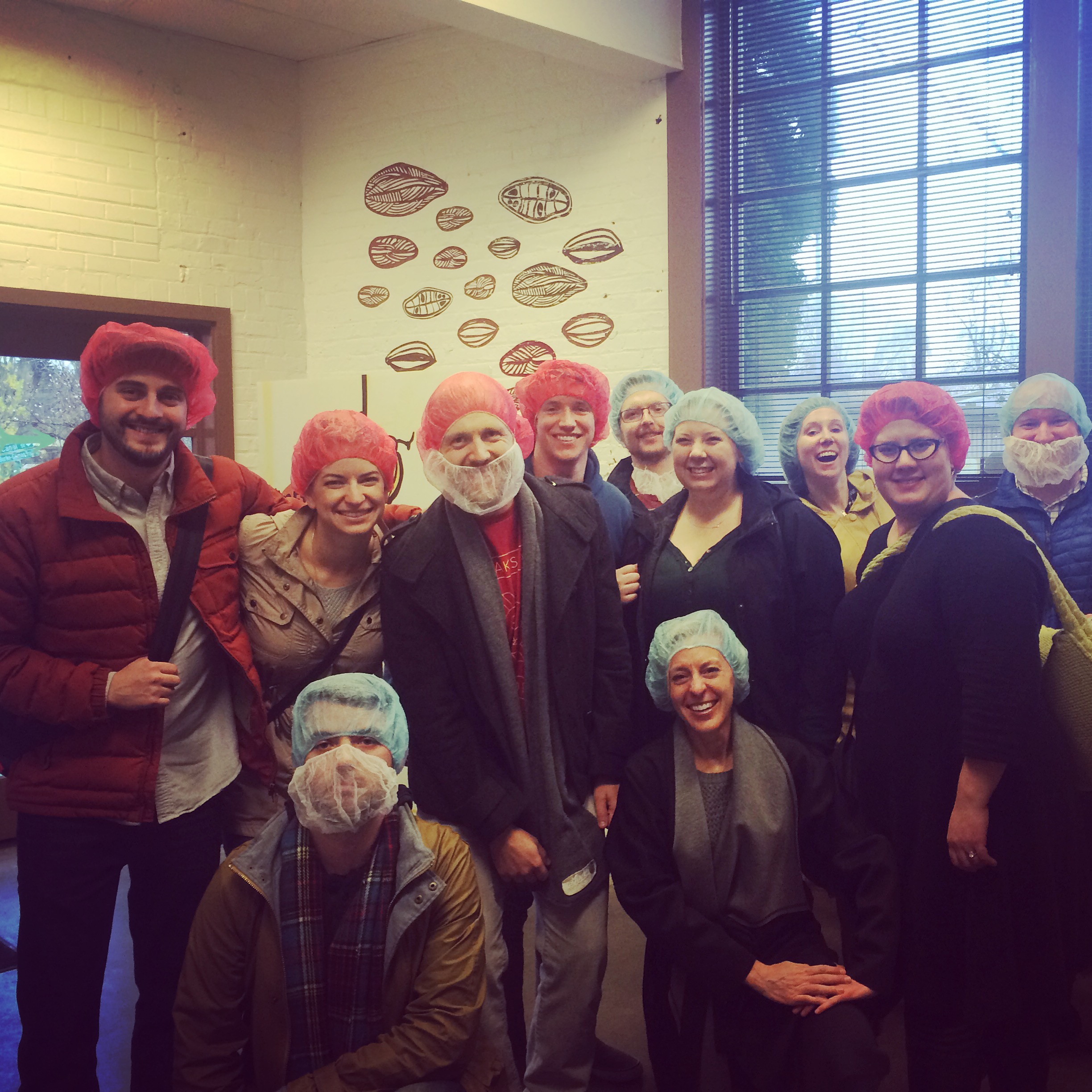 In our hair nets inside the factory.